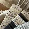 26 Calcetines de Mujer Otoño/Invierno, Nuevos Calcetines de Algodón Floral Ins de Caña Media Arrugados para Mujer, Venta al por Mayor