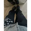 Calça cargo preta multi-bolsos estilo punk para homens e mulheres, calça casual solta de perna reta com rebites, estilo subcultural moderno