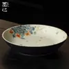 Bandeja de té de cerámica con diseño floral azul y blanco, patrón moteado rojo y forma redonda, adecuada para accesorios de ceremonia de té y uso doméstico