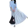 Falda de pastel Primavera Nueva Ropa exterior para mujer Cintura alta Aspecto adelgazante Falda de línea A drapeada Versátil de longitud media Dulce