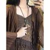 Collar de cuerda de cerámica estilo bohemio retro para mujer, nuevo estilo chino, estilo étnico, nicho, accesorios de estilo zen de alta gama.