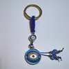 Colgante de Serie Ojo de Diablo Transfronterizo Europeo y Americano Colgante de Llavero de Joyería de Animales Ojo de Hueso con Goteo de Aceite Accesorios de Aleación para Mujeres