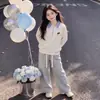 2026 primavera y otoño nuevos estilos pantalones casuales lisos simples para niñas conjunto versátil de dos piezas con top de solapa a cuadros y retazos