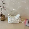 Bolsa de nylon estilo coreano con cordón de gran capacidad para mujer, nueva bolsa cruzada de un solo hombro de nicho 2026, bolsa de mano plisada para la escuela