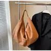 Bolsa de Ombro Única Moda de Nicho Estilo Coreano Bolsa de Mão Retro de Camurça e Pelúcia Transfronteiriça Bolsa de Bolinho Simples Casual para o Dia a Dia Bolsa de Axila