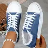Tênis de lona feminino 2026 novo modelo caveira grafite tamanho grande sola plana macia leve slip-on versátil tênis para atividades ao ar livre