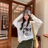 Camiseta de manga larga de algodón puro estilo retro americano para mujer, nuevo modelo primavera y otoño 2026, estilo holgado y casual, adecuada como camiseta interior