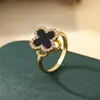 Anillo Rotatorio de Cuatro Hojas Diseño Clásico de Nicho Estilo Coreano Femenino Incrustado con Madreperla y Circonita Anillo Exquisito Venta al por Mayor