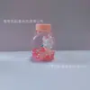 Nueva Muñeca de Conejo con Lazo de Fresa Rellena de Aceite Acrílico Combinación Creativa Llavero de Botella de Arena Movediza Accesorios de Regalo