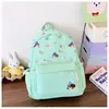 Mochila Cartoon de Novo Estilo, Bonita e com Aparência de Alta Qualidade para Estudantes do Sexo Feminino, Bolsa Escolar Leve de Grande Capacidade, Mochila Versátil de Viagem Estilo Coreano