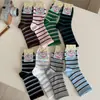 Calcetines a rayas de otoño para mujer, calcetines de media pantorrilla, estilo a rayas de primavera y otoño, calcetines largos versátiles de moda coreana ins, delgados y absorbentes de sudor para verano