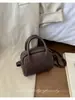 Bolso de mano de nicho transfronterizo para mujer, nuevo bolso de alta gama con patrón de lichi tipo "bolsa de pan tostado", bandolera y bolso cruzado, moderno