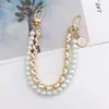 Yilian novo estilo Chanel Pérola cadeia portátil dupla cadeia pulseira pulseira caixa de telefone chaveiro-cadeia resistente a quedas atacado