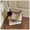 Elegante bolso de dos tonos para mujer, nuevo modelo de moda 2026, bolso de hombro simple, versátil para el trabajo y uso casual, bolso cruzado