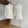 Camiseta de Algodón de Alto Giro Coreana con Protección Solar + Pantalones con Cinta Adherida Media Falda Conjunto Casual para Mujer