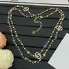 Nuevo Modelo 2025 Estilo Chanel Colorido Estrella Doble C Perla Collar Largo para Mujer, Réplica Completa de Diamante, Cadena Ligera de Lujo para Suéter Venta al por Mayor