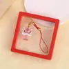 Colgante para teléfono móvil de danza del león de bendición, accesorio para bolso y llavero de coche, colgante auspicioso de hilo rojo estilo chino, disponible para venta al por mayor