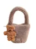 Mini Bolso de Felpa de Alta Gama Transfronterizo para Mujer Otoño e Invierno 2025 Nuevo Popular Bolso Cubo Cruzado de Mano de Felpa