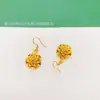 Suministro en vivo cobre bañado en oro moda color nacional flor Tianxiang gancho pendientes pendientes viento frío fábrica venta al por mayor