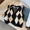 Colete Tricotado Preto e Branco Estilo Britânico com Decote em V Acolchoado Colete para Mulheres Outono e Inverno 2025 Peça de Cima Camisola Cardigan Roupa de Exterior