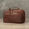 Nova Bolsa de Maquiagem Retrô 2025 Grande Capacidade Bolsa Portátil para Viagem de Negócios Bolsa de Mão em Couro Genuíno