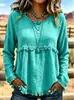Blusa longa de manga comprida, estilo boho europeu e americano, com franjas, textura e amassada, gola redonda, corte solto e ombros caídos.