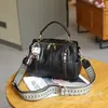 Bolsa de hombro cruzada de verano nuevo modelo de piel de oveja negra original hecha a mano estilo universitario retro simple casual mochila