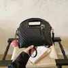 Bolso bandolera estilo francés transfronterizo 2026 nuevo verano tejido moda diario texturizado bolso bandolera bolso cubo