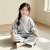 Conjunto de Dos Piezas Dopamina Transfronterizo para Niñas, Sudadera Dulce de Moda con Lazo y Pantalones de Pierna Ancha, Nuevo para Primavera y Otoño 2026