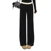 Pantalones casuales grises, ligeramente acampanados para mujer, nuevo estilo de otoño, diseñados para figuras tipo pera, corte holgado, efecto adelgazante y con un diseño moderno, fluido y de pierna recta.