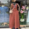 Ropa de Mujer Transfronteriza Europea y Americana 2026 Primavera Nuevo Estilo Elegante Color Sólido Cuello en V Sin Mangas Conjunto de Pantalones de Pierna Ancha de Cintura Alta