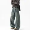 Marca de moda 2026 Otoño Nuevos Jeans Americanos Patchwork Deconstruidos Pierna Curva para Hombre High Street Pantalones Largos de Pierna Ancha