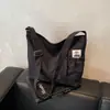 Mochila Transfronteriza Nuevo Estilo Coreano Color Sólido Bolso de Hombro Casual Simple Estudiante Mochila para Clase Versátil para Viajar Bolso de Mano