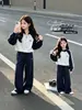 Conjunto Deportivo para Niña Otoño 2026 Nuevo Elegante Estilo Coreano para Niños Bloque de Color Sudadera con Capucha y Cuello Alto Pantalones de Pierna Ancha Conjunto de Dos Piezas