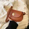 Bolso popular para mujer 2023 nuevo nicho moda todo partido hombro bandolera axila bolso alta calidad retro bolso de sillín