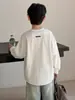 Sudadera para Niños Otoño 2026 Nuevo Estilo Camiseta de Manga Larga para Niños Estilo Urbano Fresco Blanca Para Niños Grandes Capa Base de Primavera y Otoño