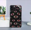 Funda de Teléfono Estilo Oscuro Ojo del Diablo Adecuada para Apple 17 Pro Max, Funda Dura de Vidrio Brillante de Cobertura Total, Directamente de Fábrica