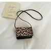 Diseño único de patchwork con estampado de leopardo y colores contrastantes, nuevo bolso de mano de moda casual primavera 2026, bolso pequeño cuadrado de hombro y cruzado para mujer