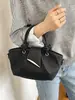 Bolso de mano transfronterizo para mujer 2026 nuevo de alta gama simple versátil plisado de hombro cruzado bolso cubo para ir al trabajo