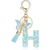 Llavero de Resina de Venta Caliente Transfronterizo 26 Letras Llavero de Moda Colgante de Mariposa Llavero de 26 Letras Mayoreo