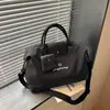 Bolsa de viagem bicolor para mulheres, bolsa de mão de grande capacidade e bolsa transversal, design de nicho 2026, bolsa de armazenamento personalizada para viagens curtas e viagens de negócios