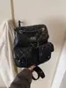 Mochila con cadena rómbica para mujer, diseño de nicho, estilo cubo, informal, para viajes, 2025
