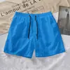Transfronterizo 2024 moda masculina comercio exterior pantalones casuales color liso pantalones de playa shorts deportivos para fitness de hombre diez colores