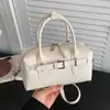 Bolso tipo almohada versátil y elegante transfronterizo para mujer, con un diseño de inspiración coreana, perfecto para el uso diario, ir al trabajo y como un simple bolso cruzado.