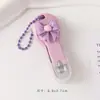 Cortador de Unha Fofo de Desenho com Laço Cortador de Unha Portátil Pacote Único Cortador de Unha Anti-Salpicos Ferramenta de Manicure