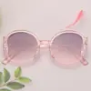 Nuevas gafas infantiles color caramelo lindas gafas de sol infantiles montura redonda visera de sol lindas gafas de sol cóncavas para bebé