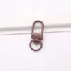 Hebilla de Puerta Colorida Pintada Aleación de Zinc Llavero Universal Hebilla Gancho Hebilla de Peluche de Dibujos Animados Accesorios para Joyería DIY Venta al por Mayor