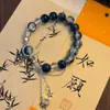 Ventas Directas de Fábrica Changyue Jinming Vino de Mora Derivado Pulsera de Vidrio Hecha a Mano Pulsera de Borlas Multicapa de Alto Valor y Gama Alta
