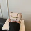 Bolsa feminina 2026 primavera novo modelo bolsa de ombro para o dia a dia, bolsa de ombro transversal com design de nicho, elegante e simples