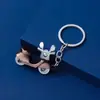 Llavero Nuevo al por Mayor Llavero de Motocicleta Llavero Personalizado de Motocicleta Llavero de Vehículo Eléctrico Trabajo Burrito Pequeño